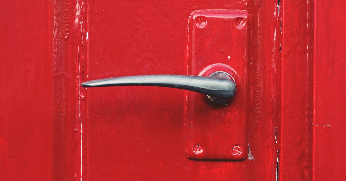 locksmith unlocking front door — Harlem Locksmith NYC